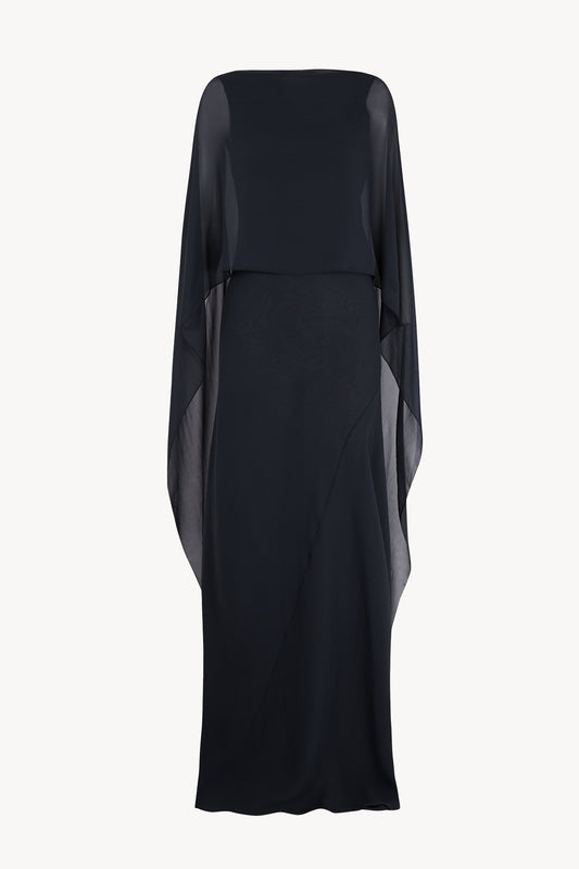 Galea, dressed in a dark navy blue silk cape