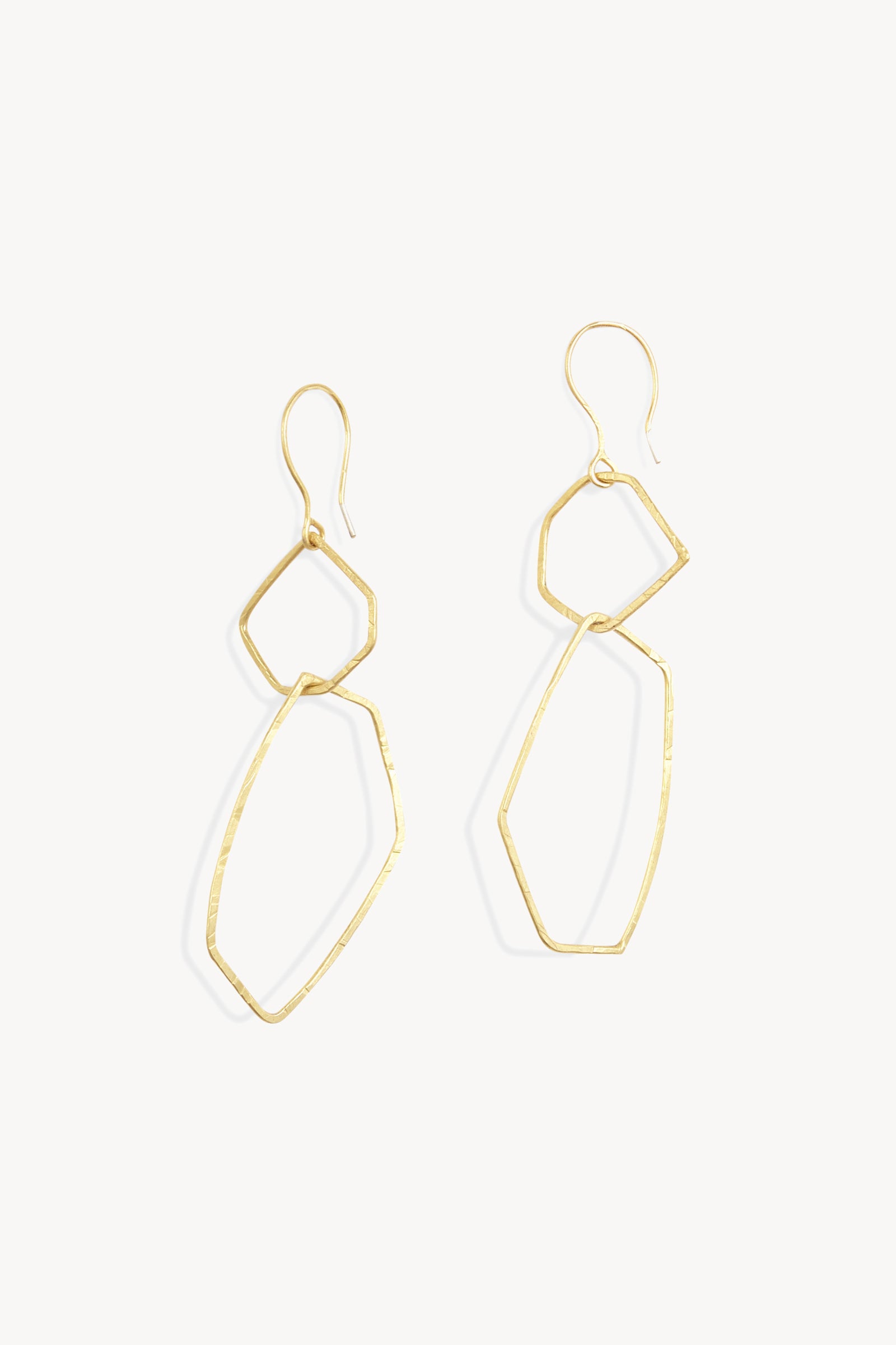 Irus L, gold earrings