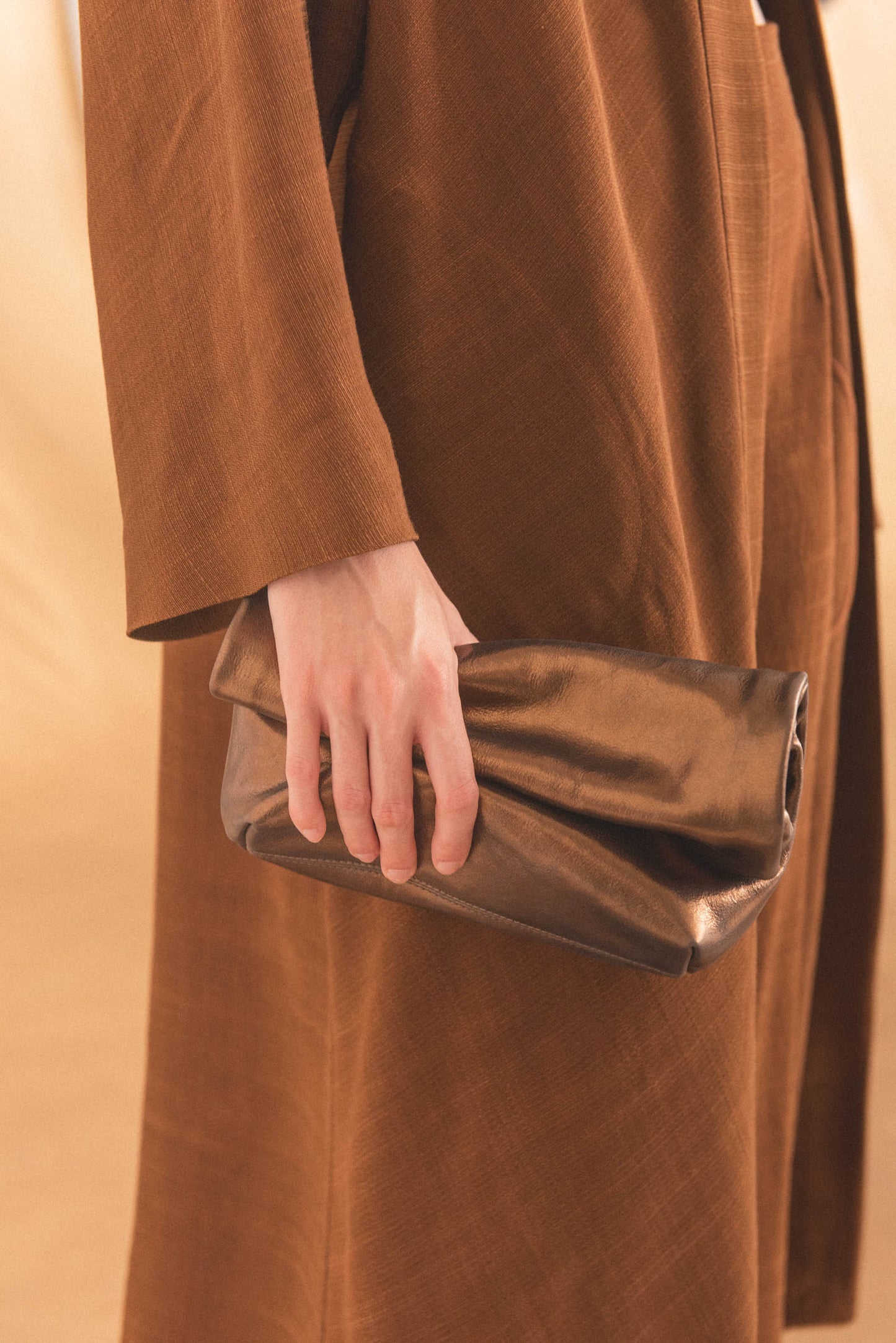 Delhi S, dark bronze leather clutch