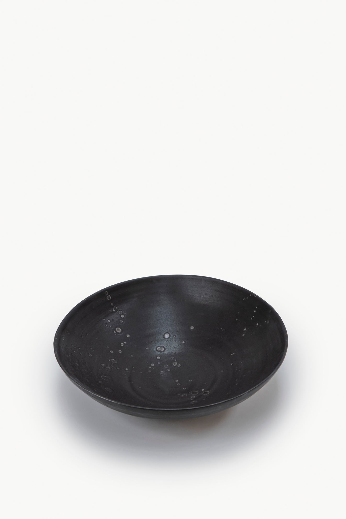 Plato redondo noir