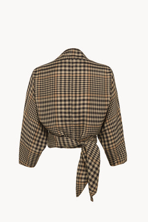 Antes, chaqueta a cuadros de cupro
