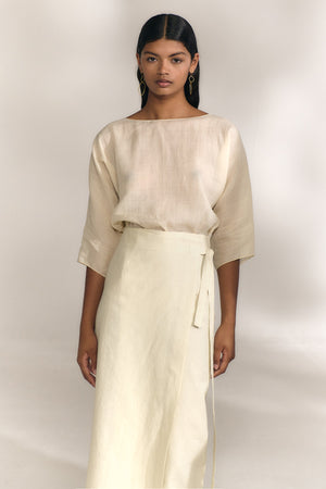 Arena, top oversize de ramio marfil