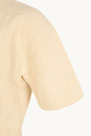 Cala, chaqueta entallada de lino beige mares