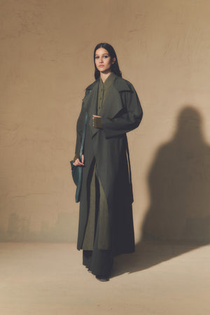 Camille, green coat