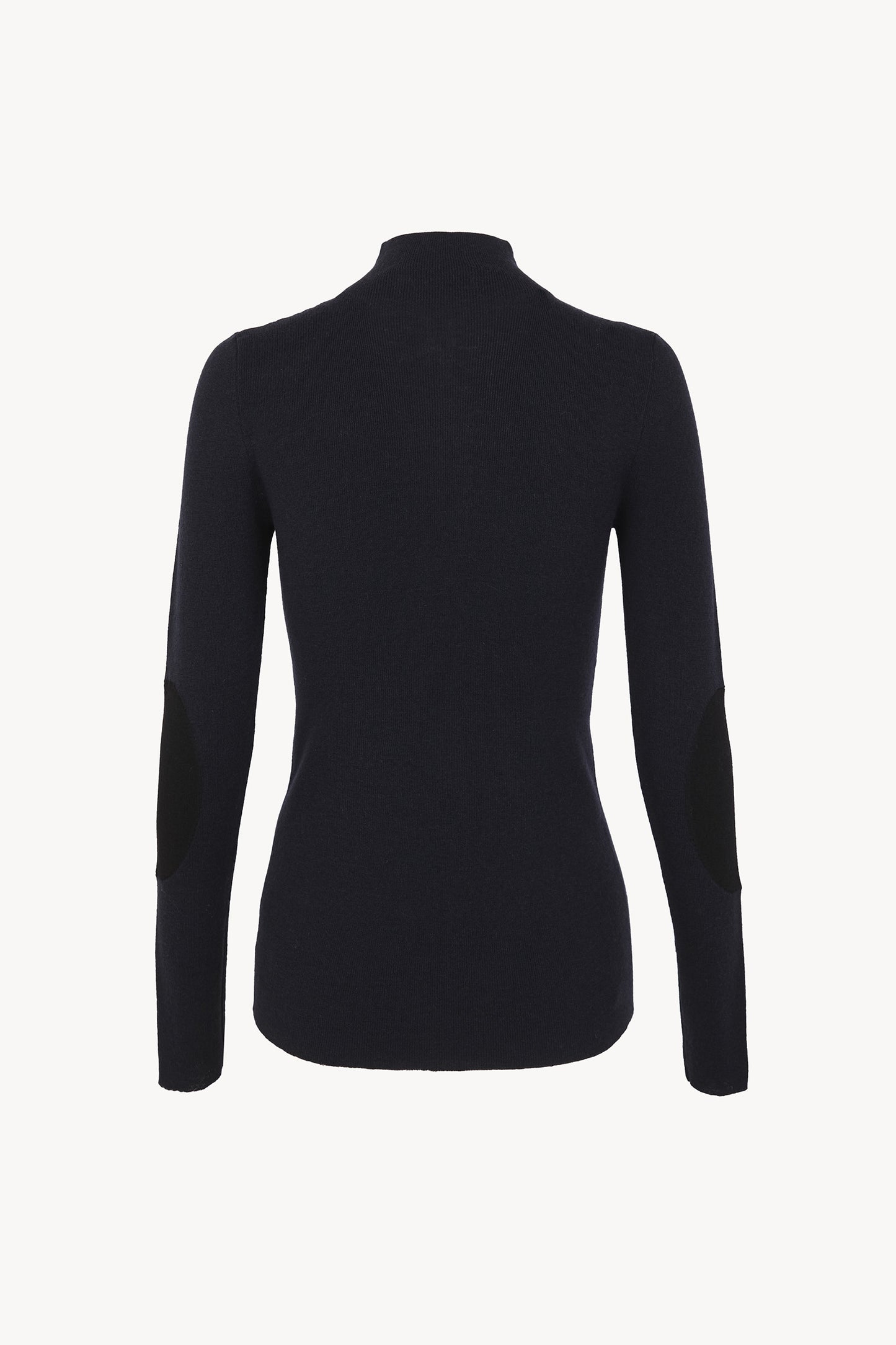 Cano, blue turtleneck jumper