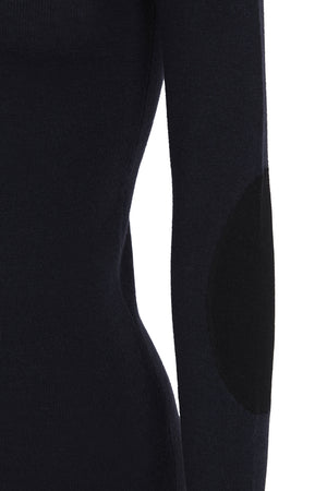 Cano, blue turtleneck jumper