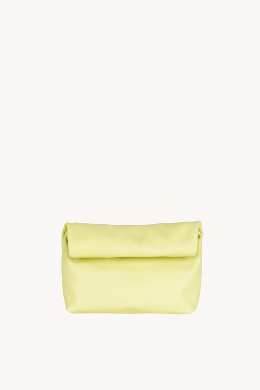 Delhi S, pale canary leather clutch