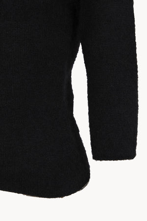 Eira, top de punto con cuello barco negro