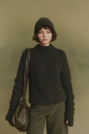 Igloo, manguitos de cachemir y seda verde oscuro