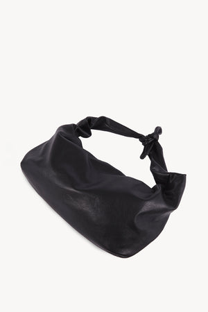 Jin L, black leather fanny pack