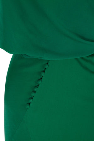 Land, emerald green silk dress