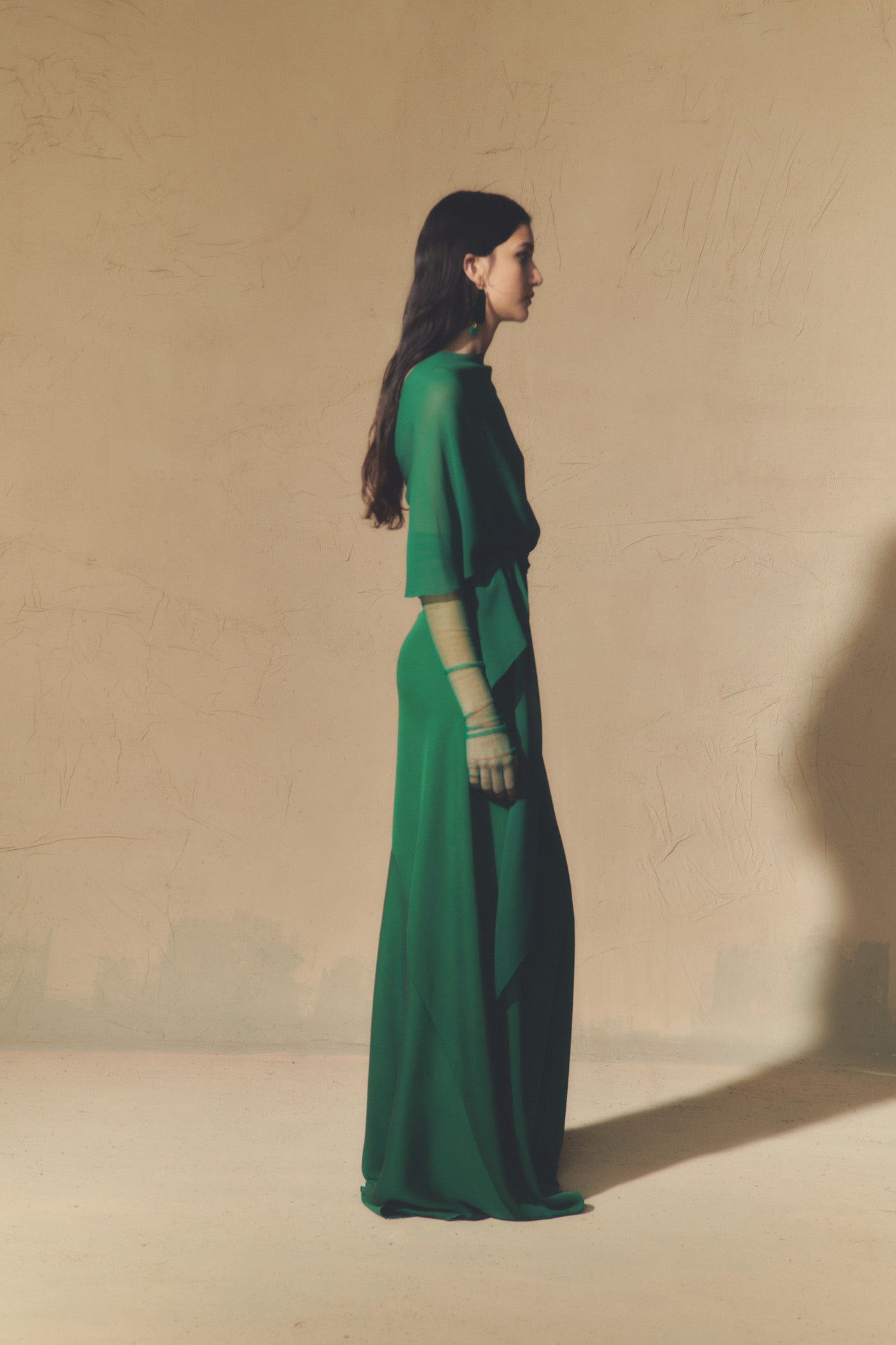 Land, emerald green silk dress