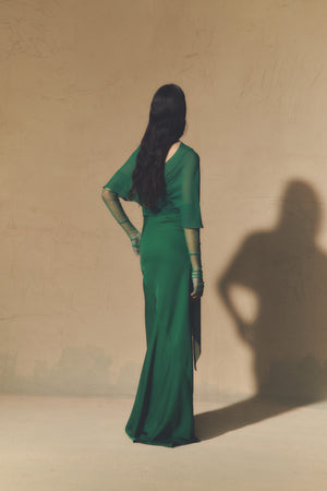 Land, emerald green silk dress