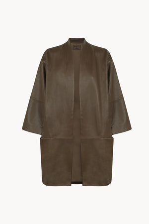 Lira, khaki fur coat