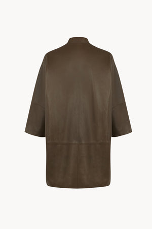 Lira, khaki fur coat