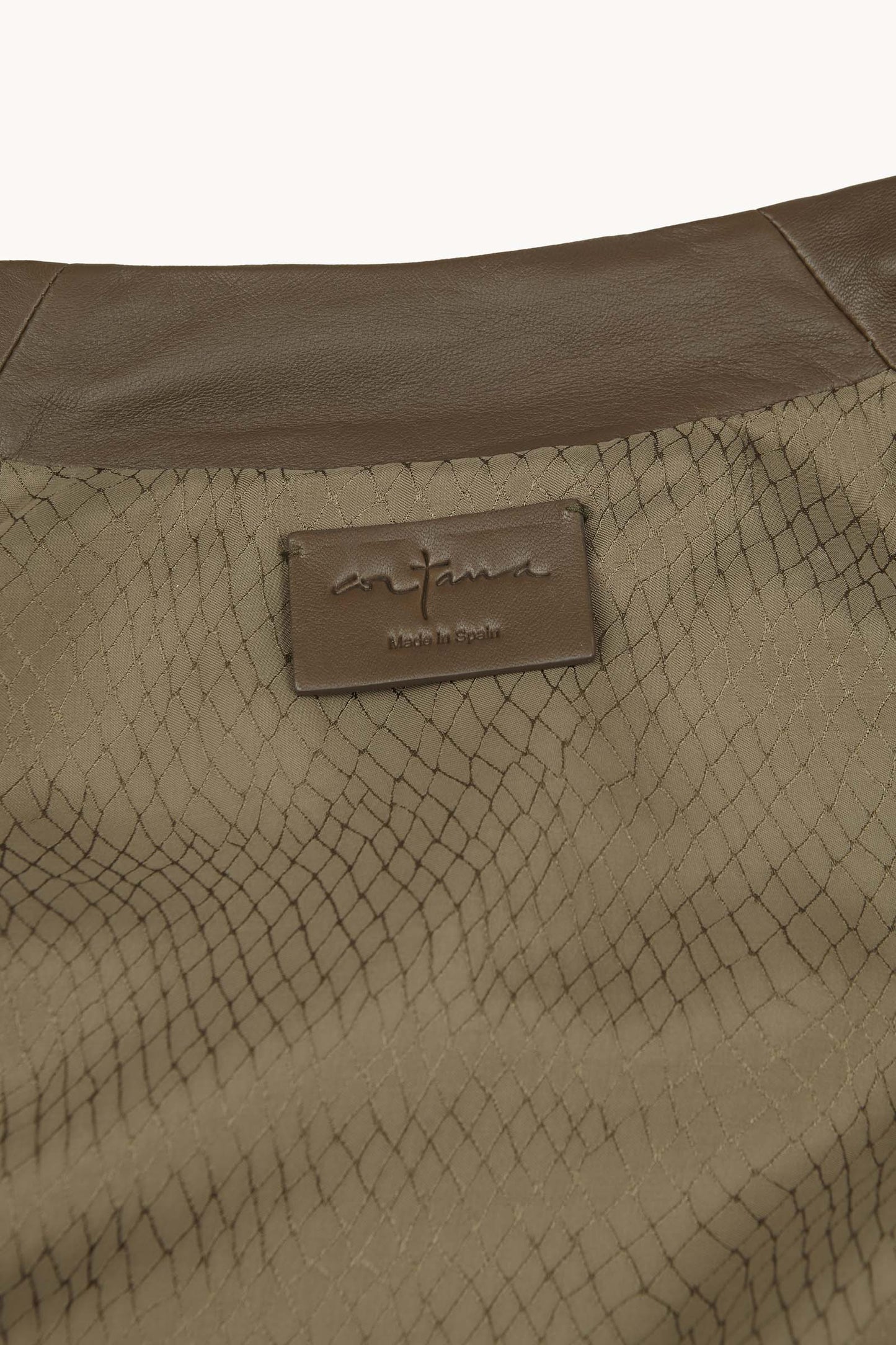 Lira, khaki fur coat