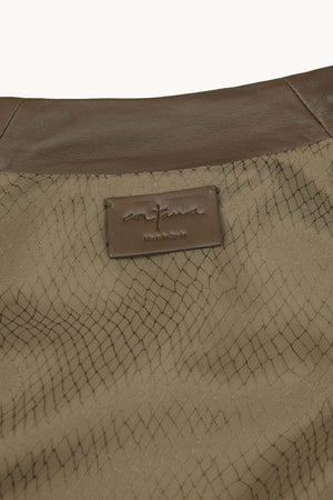 Lira, khaki fur coat