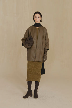 Lira, khaki fur coat