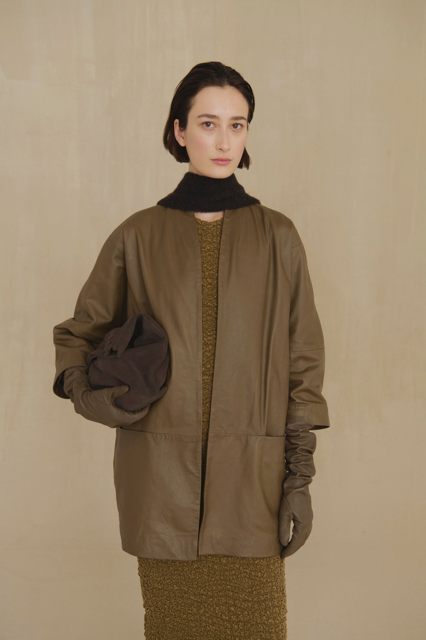 Lira, khaki fur coat