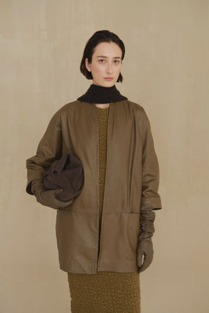 Lira, khaki fur coat