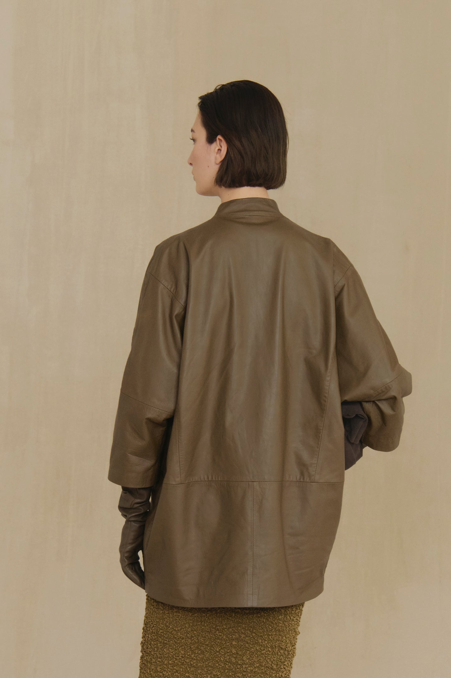 Lira, khaki fur coat