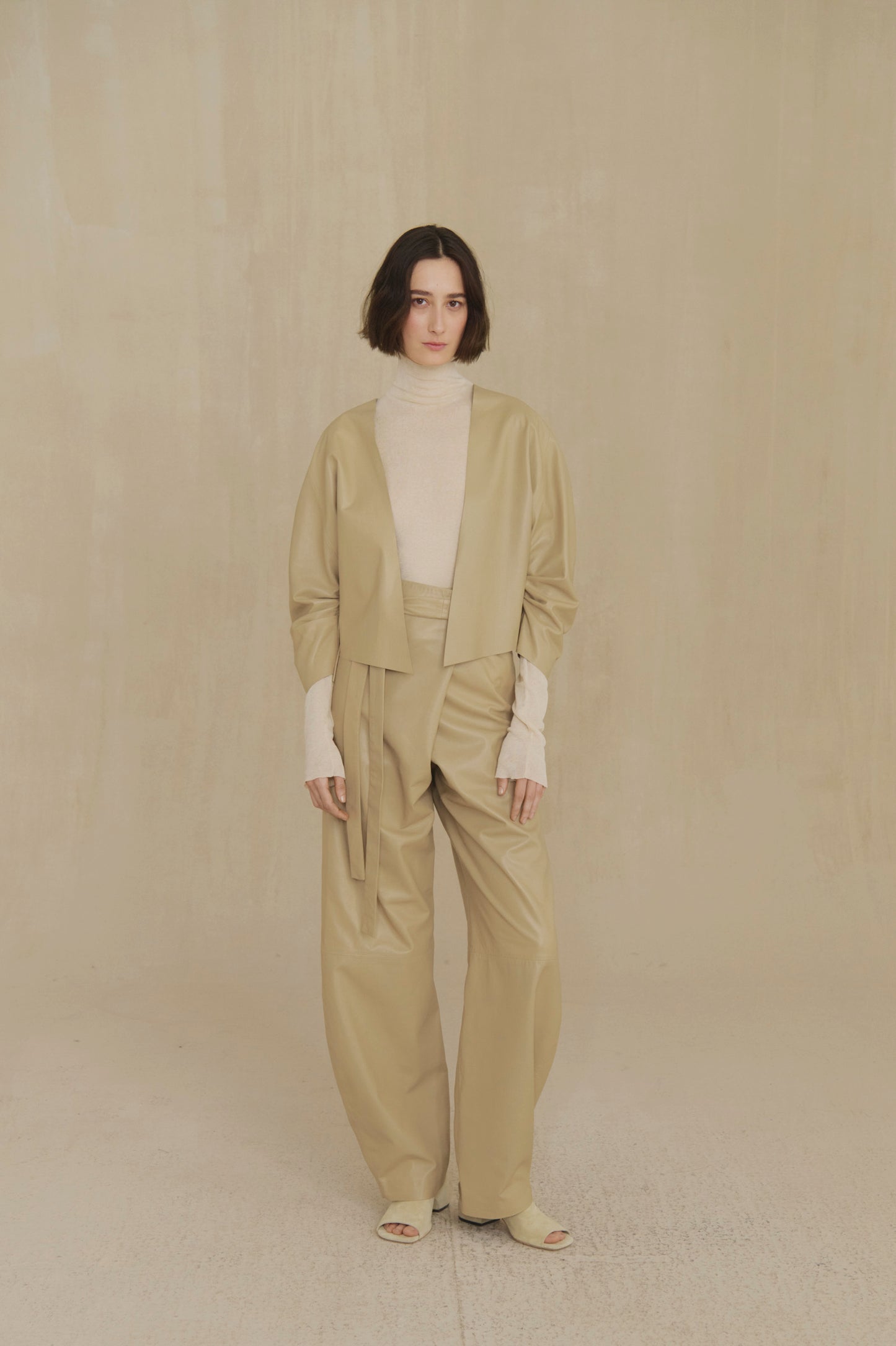 Lira, khaki fur coat