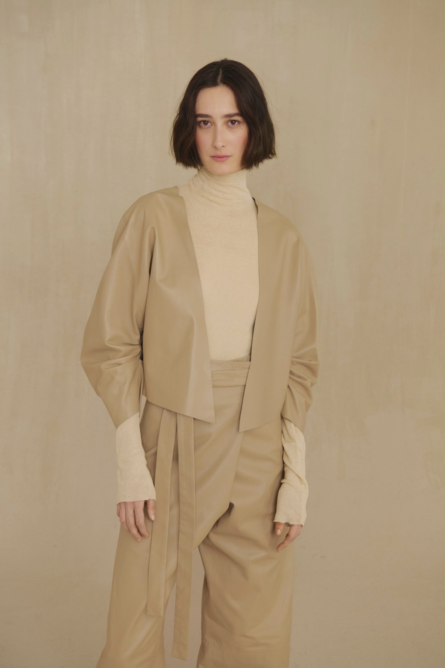 Lira, khaki fur coat
