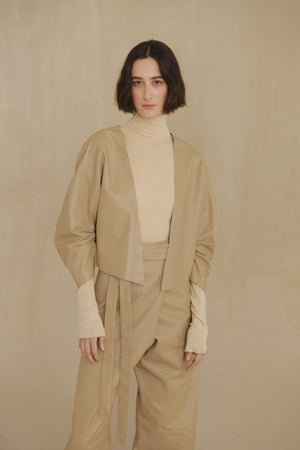 Lira, khaki fur coat