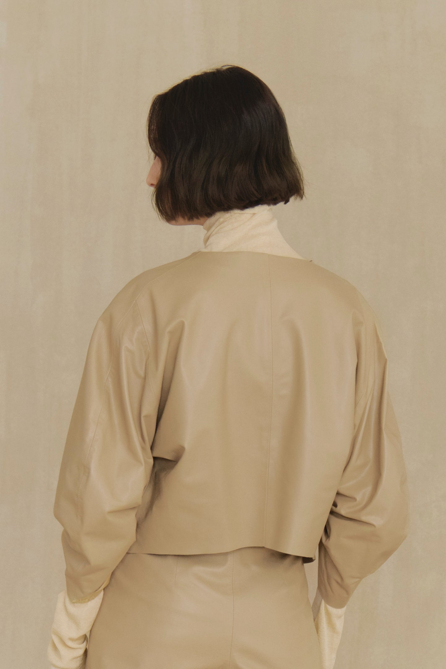 Lira, khaki fur coat