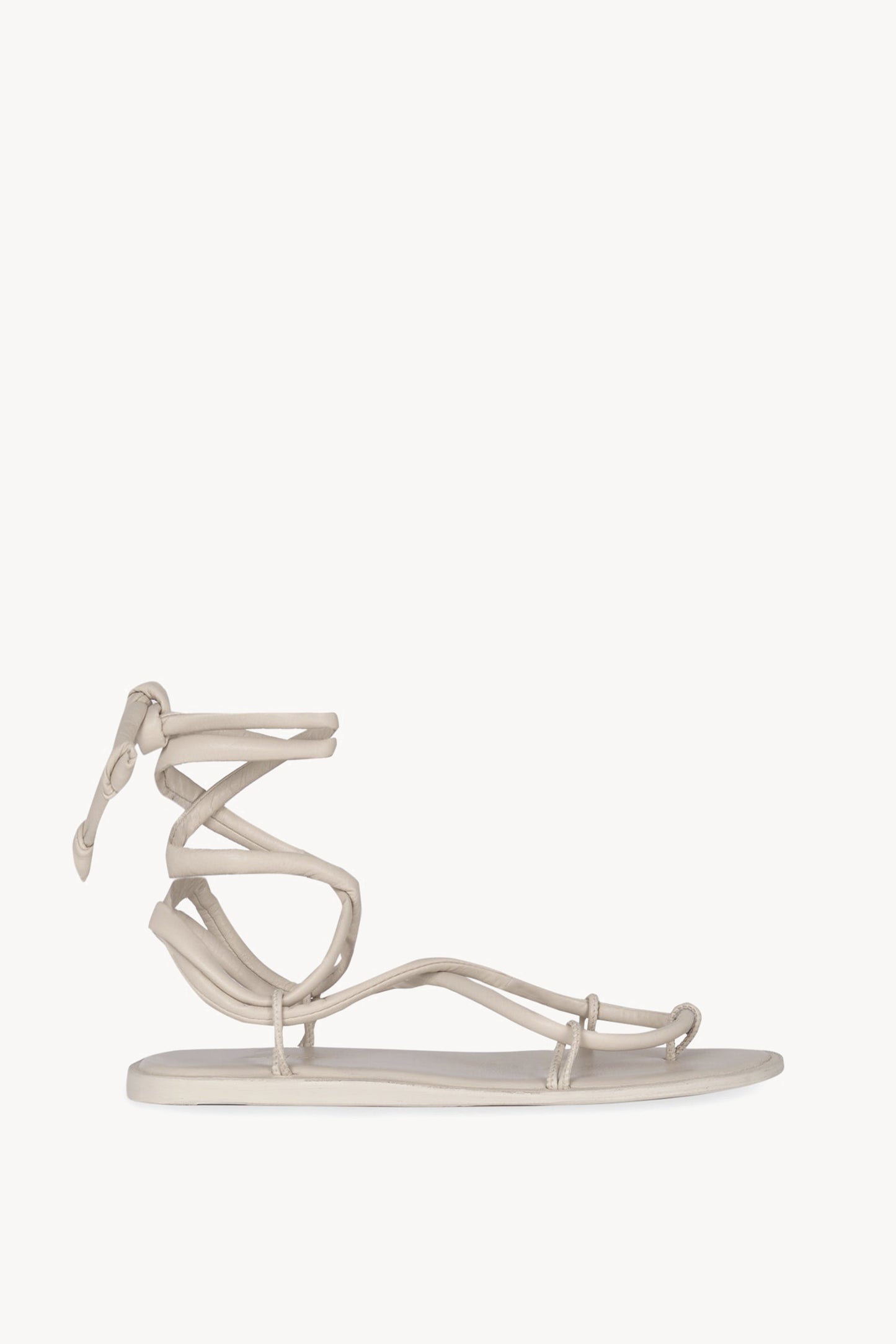 Lou, sandalia plana en beige