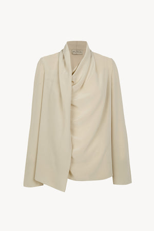 Lyra, blusa asimetrica de seda beige