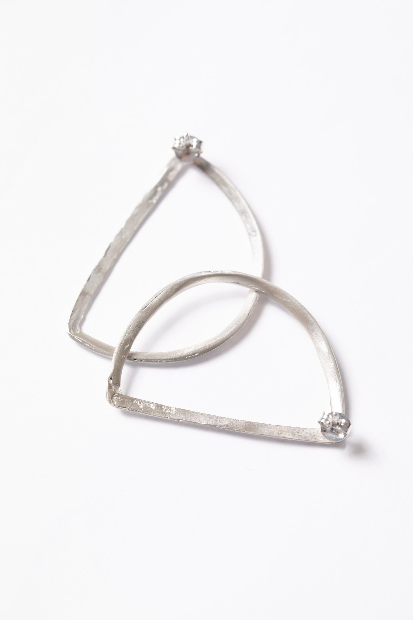 Maa left, individual silver earring