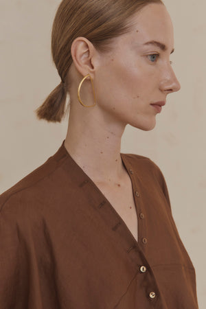 Maa right, single gold earring