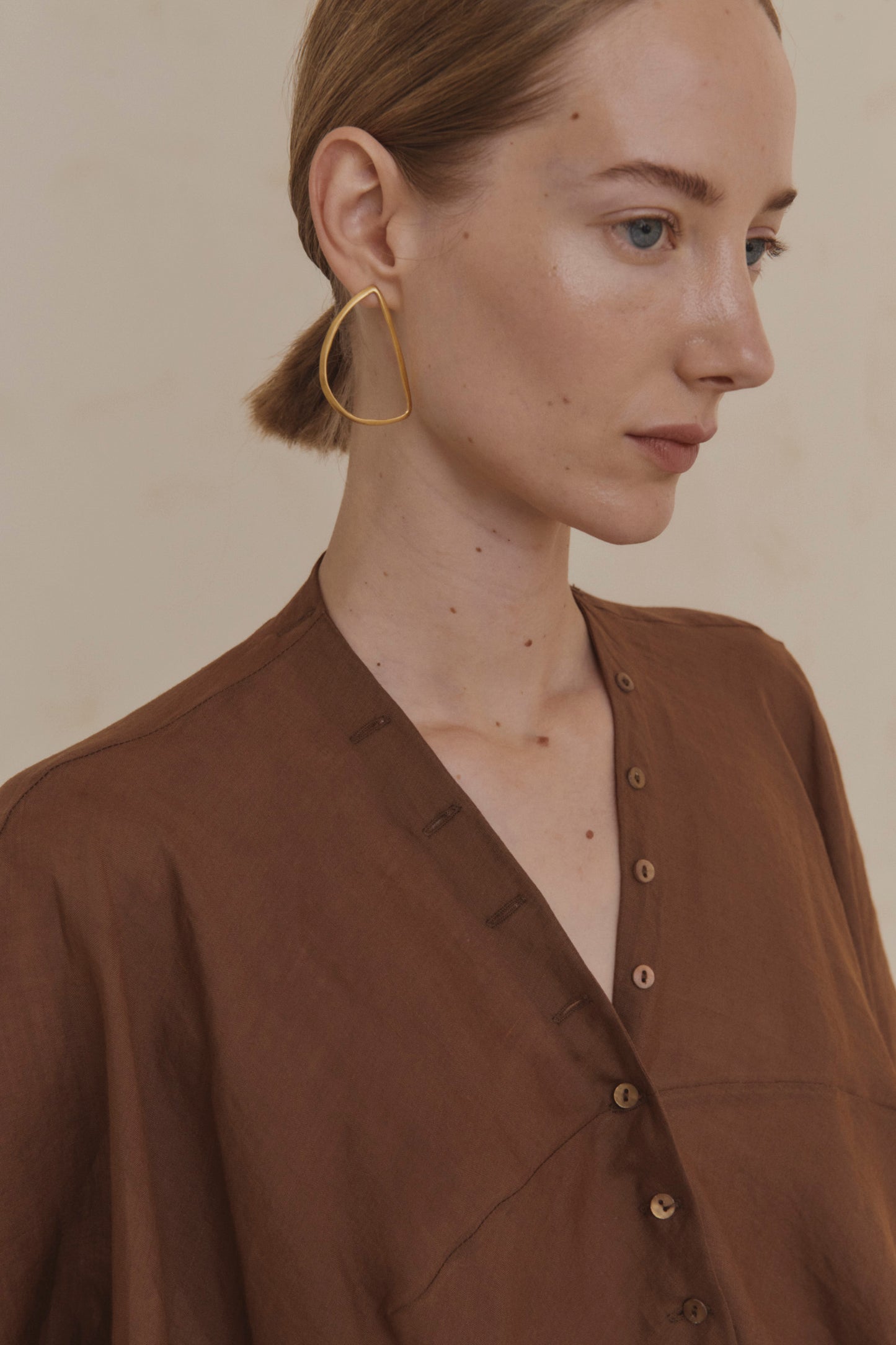 Maa right, single gold earring