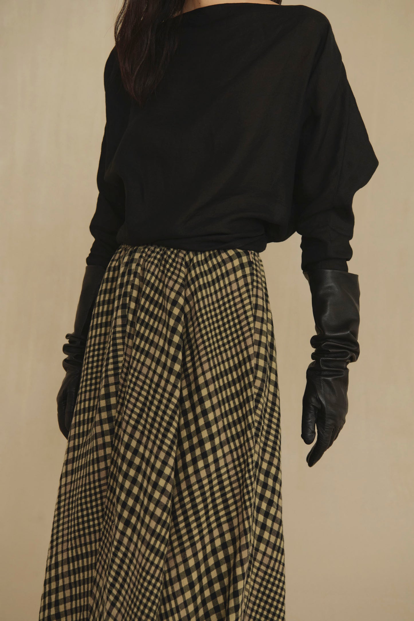 Jin, black leather gloves