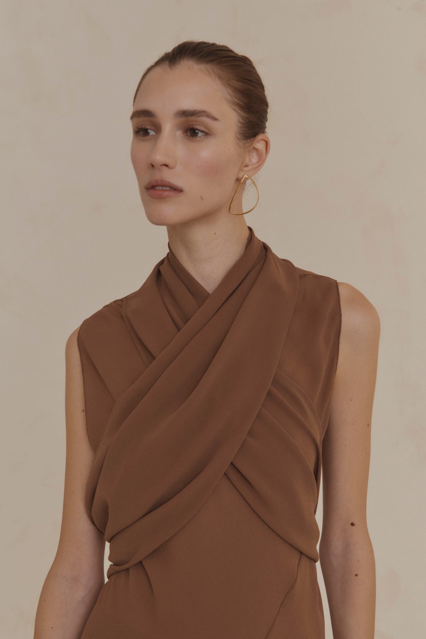 Maa left, single gold earring