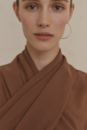 Maa left, single gold earring