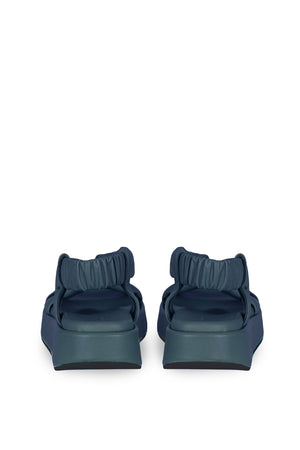 Suro, flat sandal in ocean green