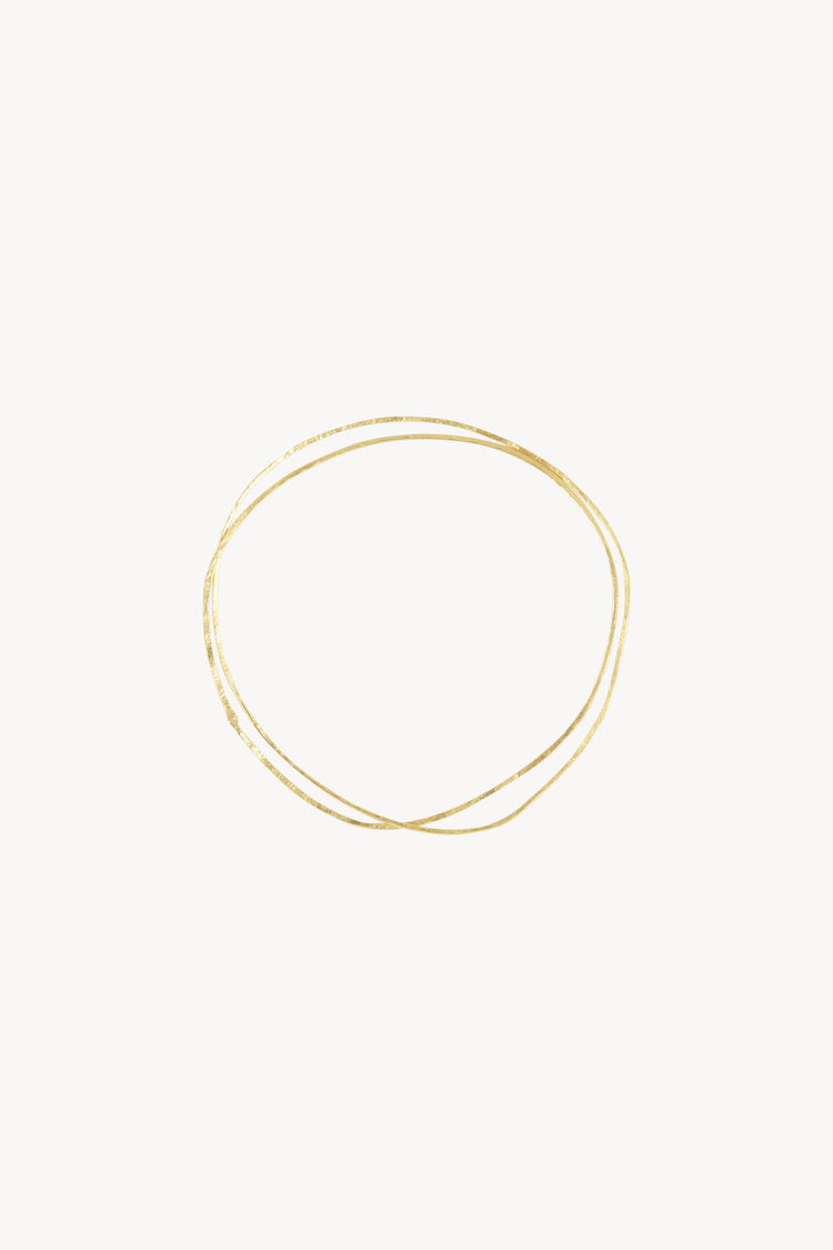 Thalo, pulseras entrelazadas doradas