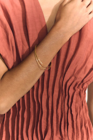 Thalo, pulseras entrelazadas doradas