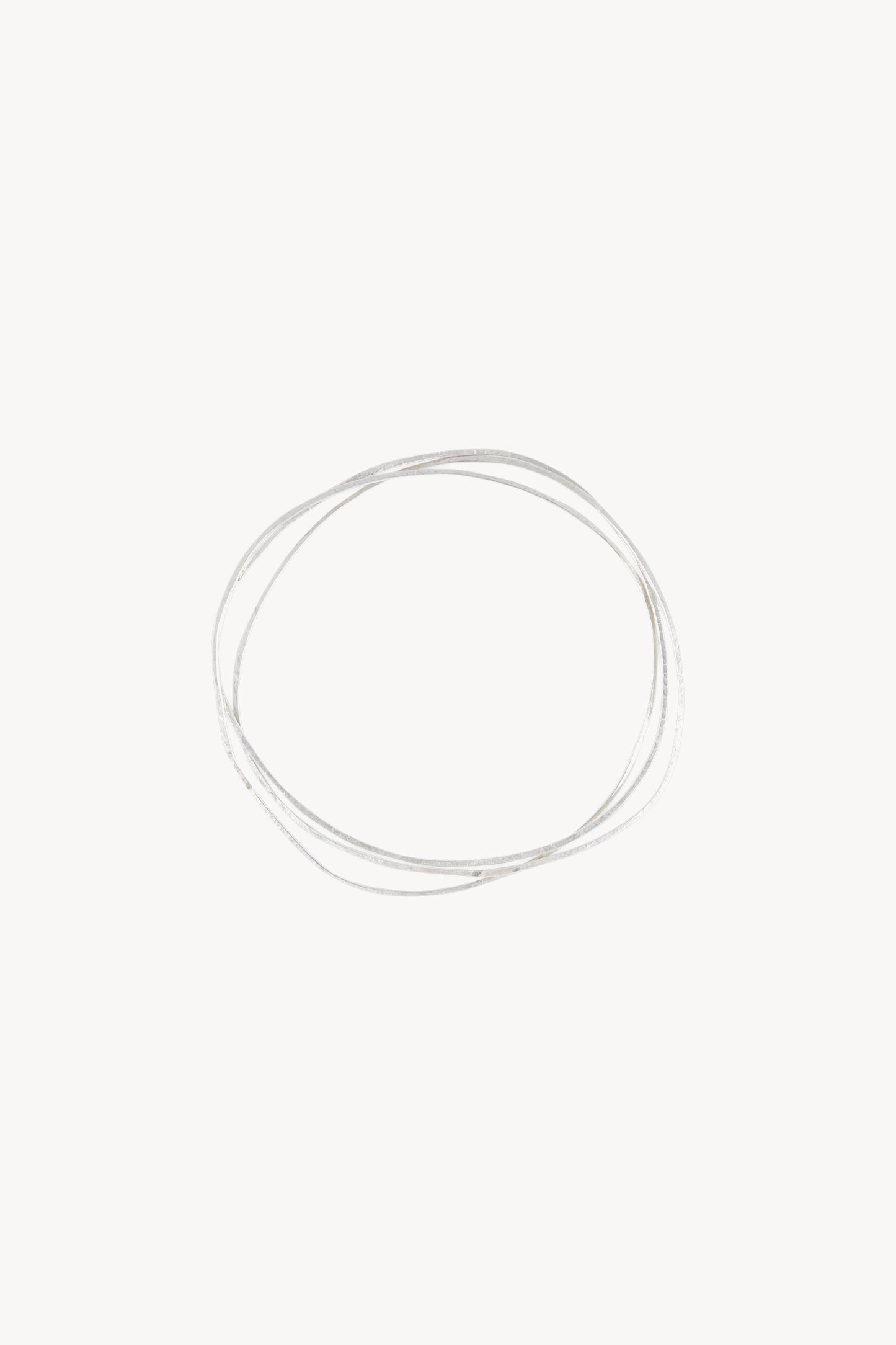 Thalo, intertwined silver bracelets