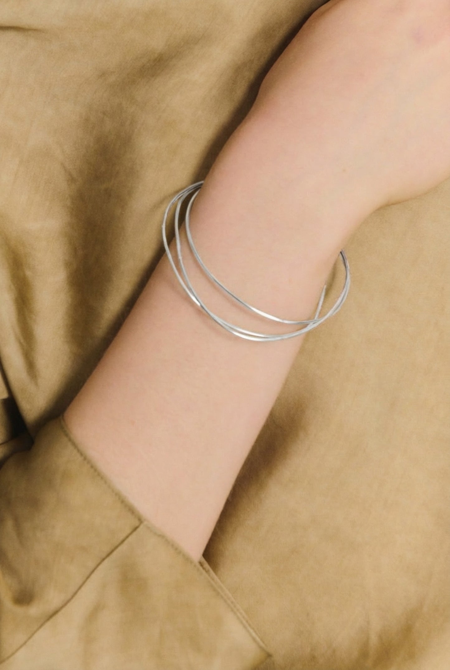 Thalo, intertwined silver bracelets