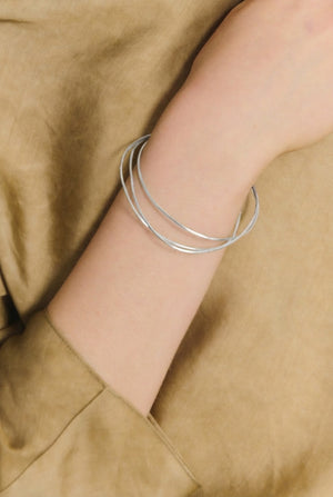 Thalo, intertwined silver bracelets