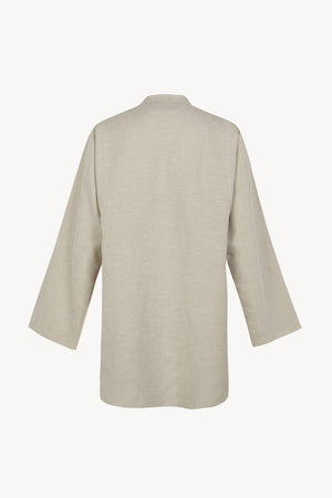 Tilo, gray and brown striped shirt