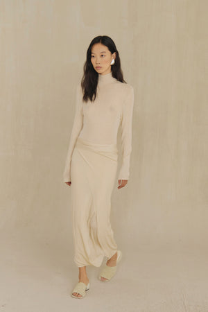 Tiva, vestido transformable de punto marfil