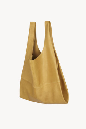 U XL, mustard leather bag