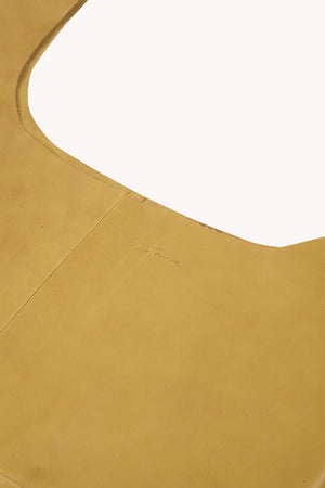 U XL, mustard leather bag