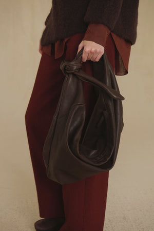 Jin L, dark brown leather belt bag