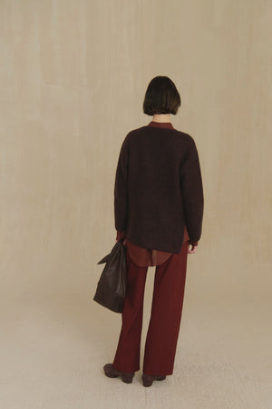 Jin L, dark brown leather belt bag