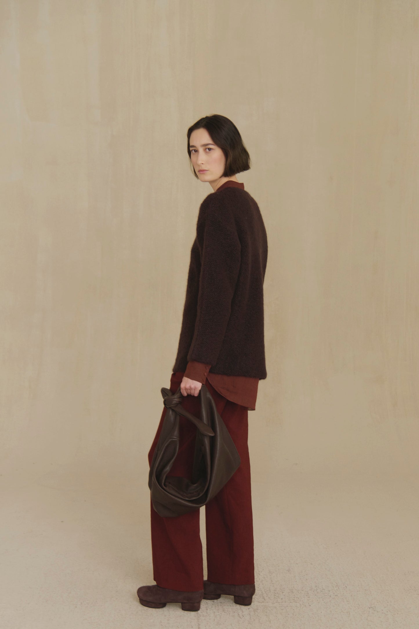Jin L, dark brown leather belt bag